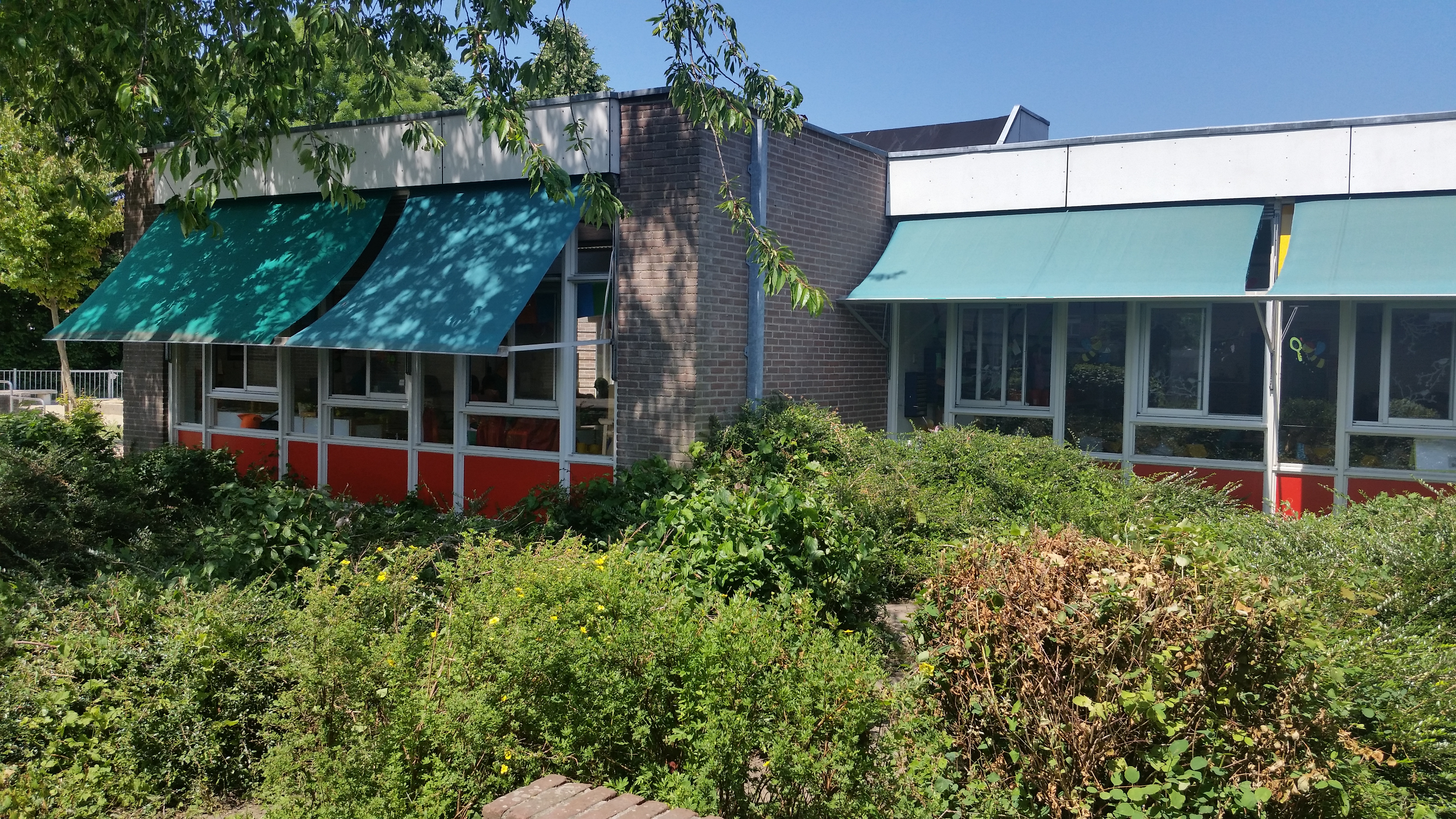 Uitvalscherm groen school Hennie’s Zonwering